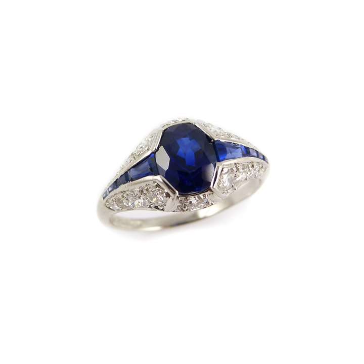 Sapphire and diamond cluster ring, the central cushion shaped sapphire 1.48ct
